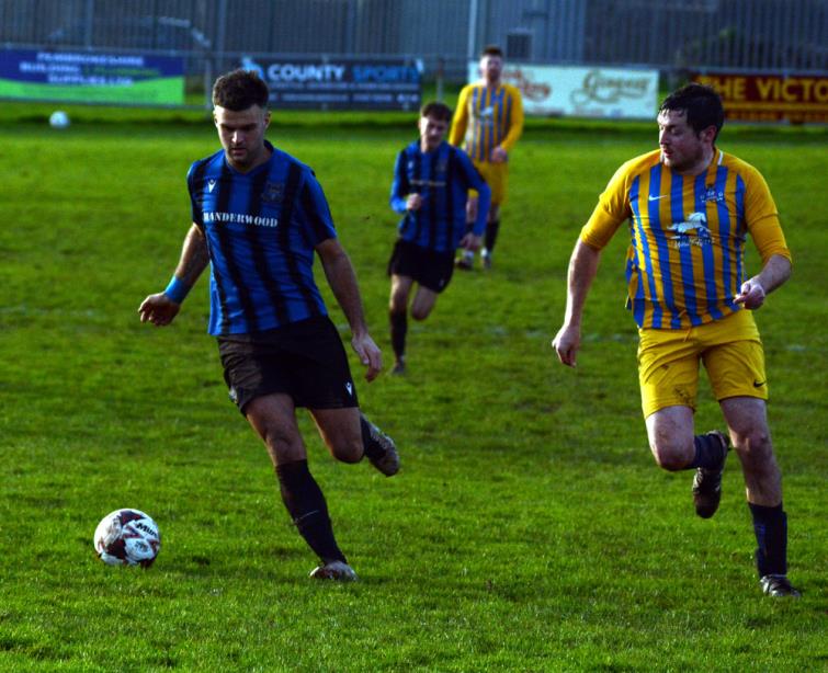 Ashley Bevan attacks for Hakin against Kilgetty